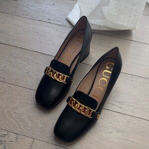 Gucci Black Flats with Gold Chain Detail